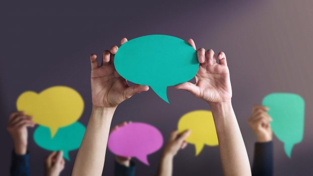 Freedom of Speech Concept. Group of People Protesting or making Campaign with a Blank Speech Bubble. Expression for the Human Rights